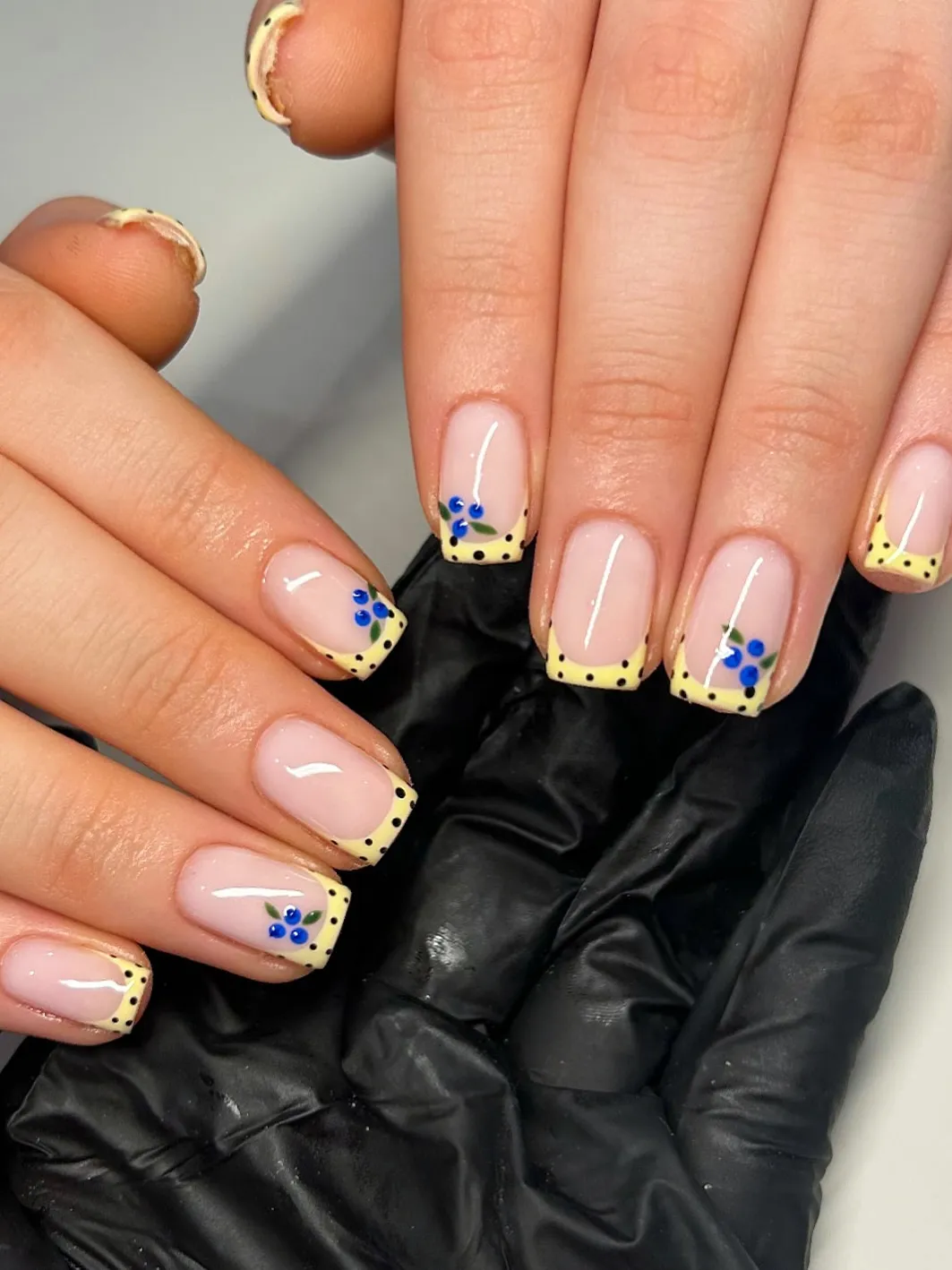 Yellow French Tips with Black Dots and Blue Berry Motifs