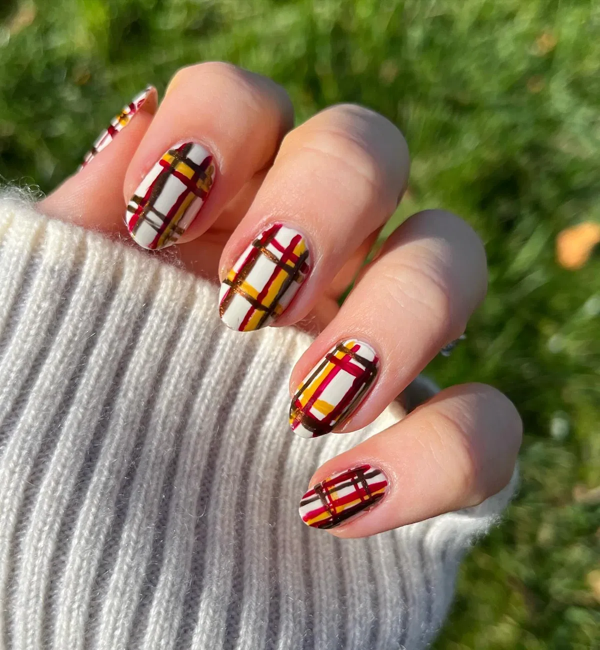 Cream-based plaid with burgundy, mustard, and dark lines