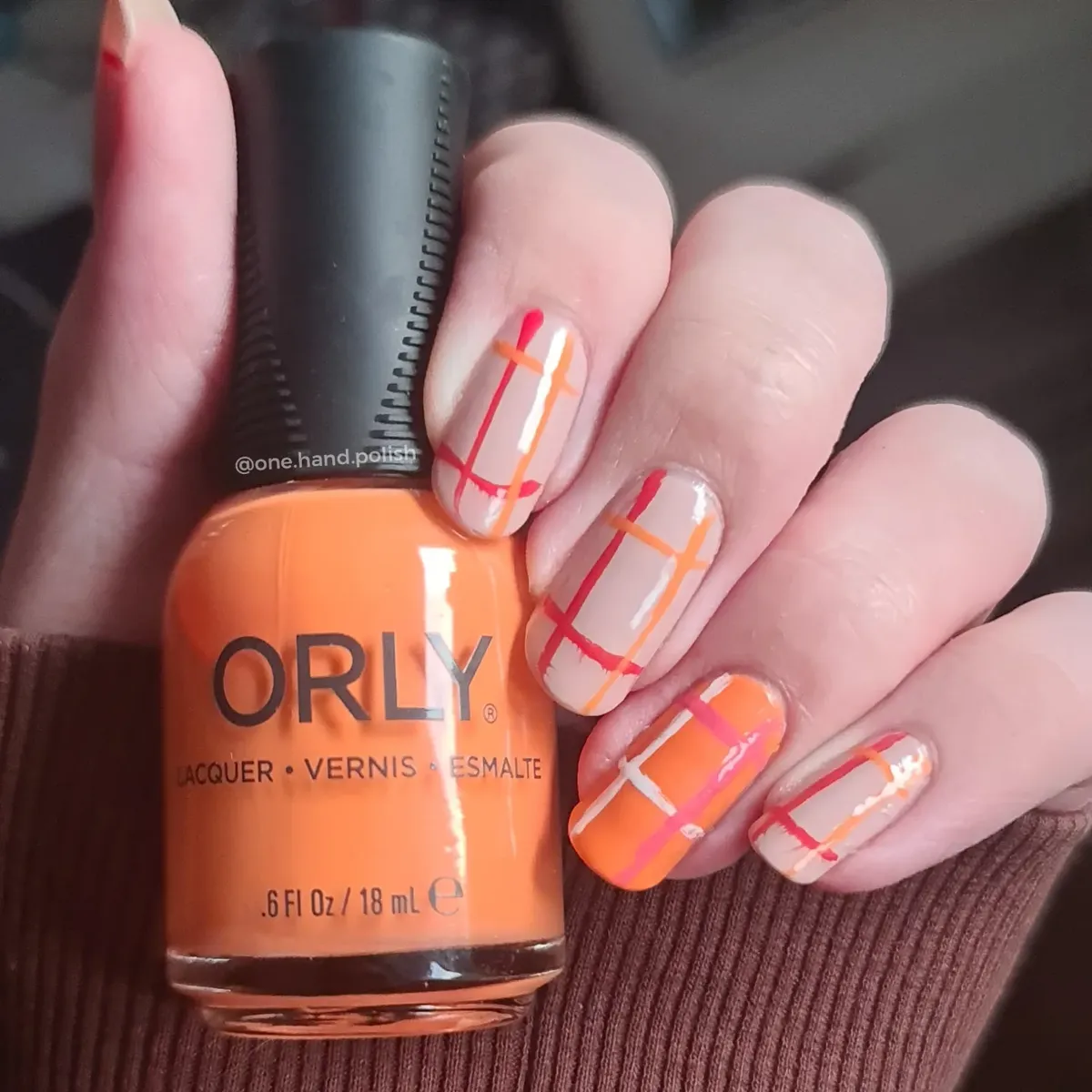 Red-and-orange plaid with an ORLY bottle shot