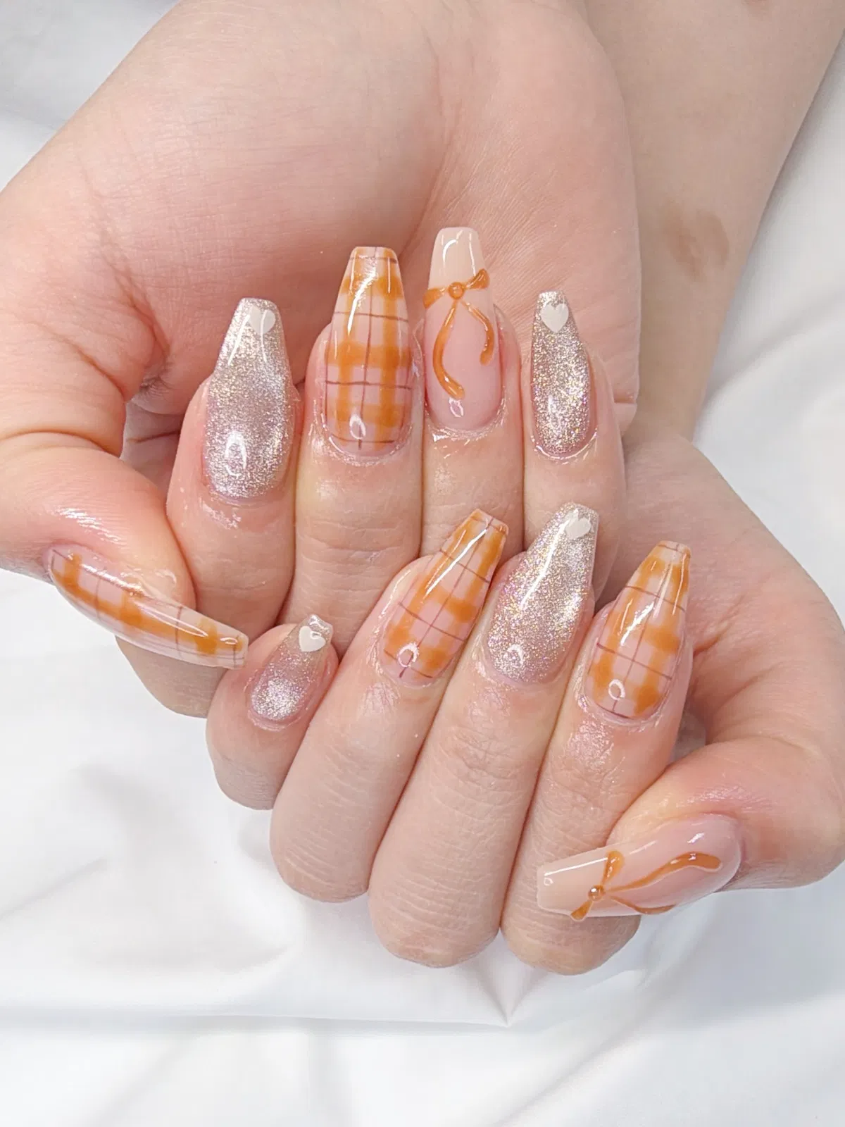 Orange plaid with silver glitter and bow accents