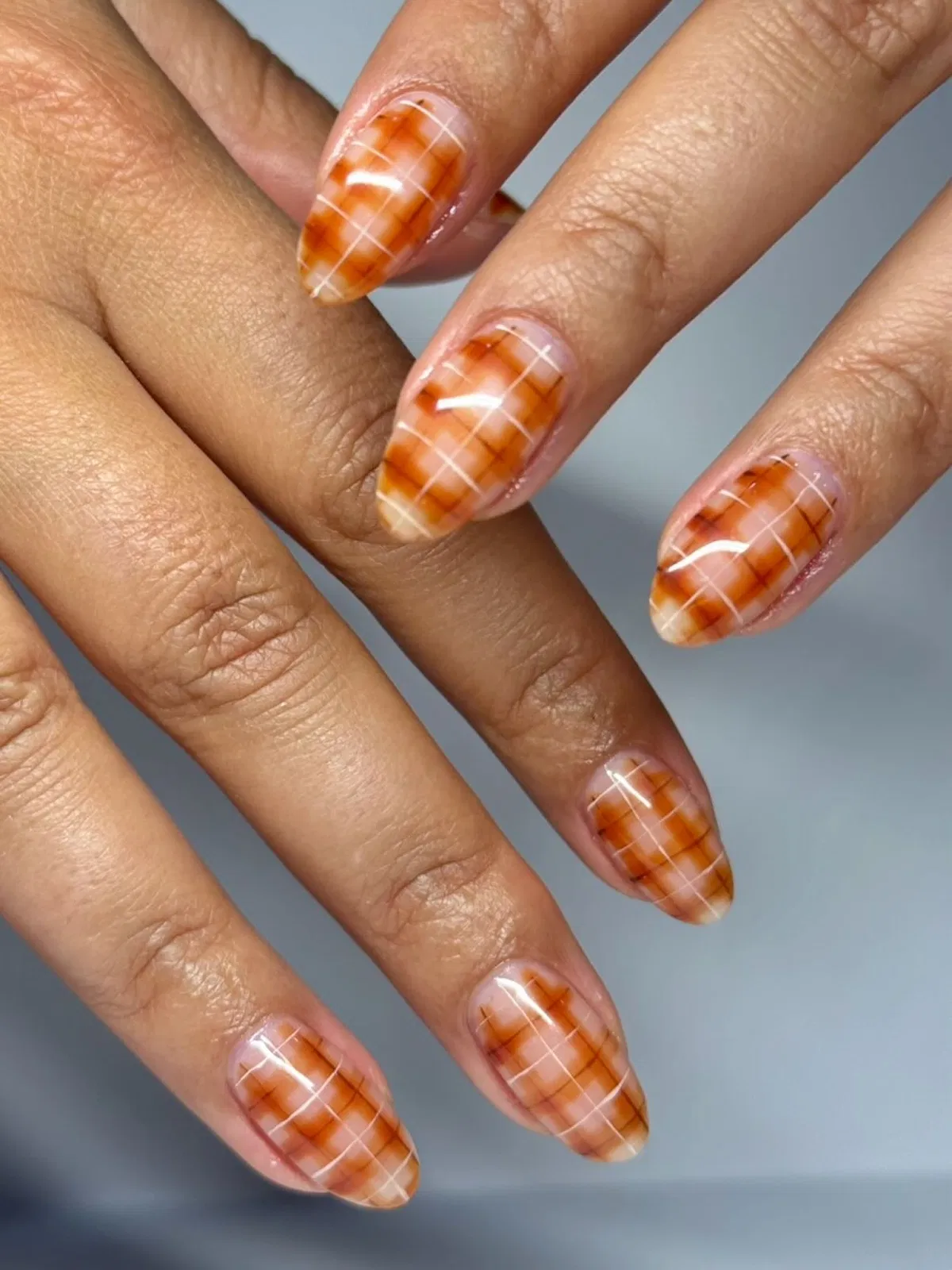 All-over orange plaid with white grid lines