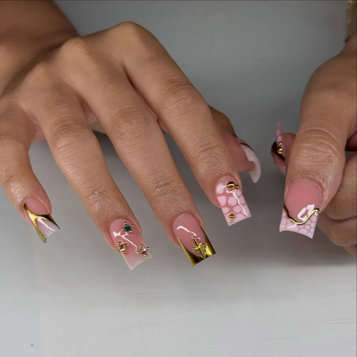 Gold-tipped squares with studded accents and patterned tips