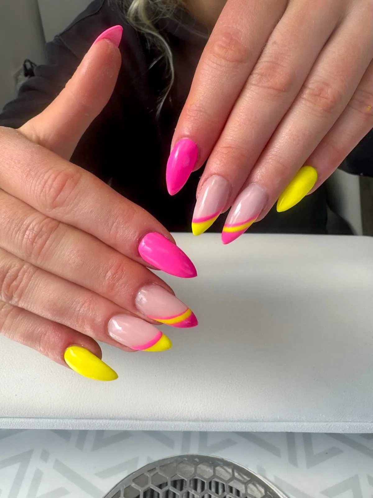 Bold solids with diagonal pink-and-yellow tip stripes