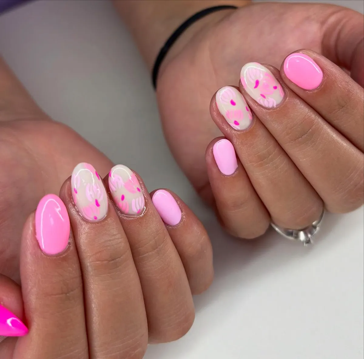 Light pink solids with translucent accents and bright pink dot details