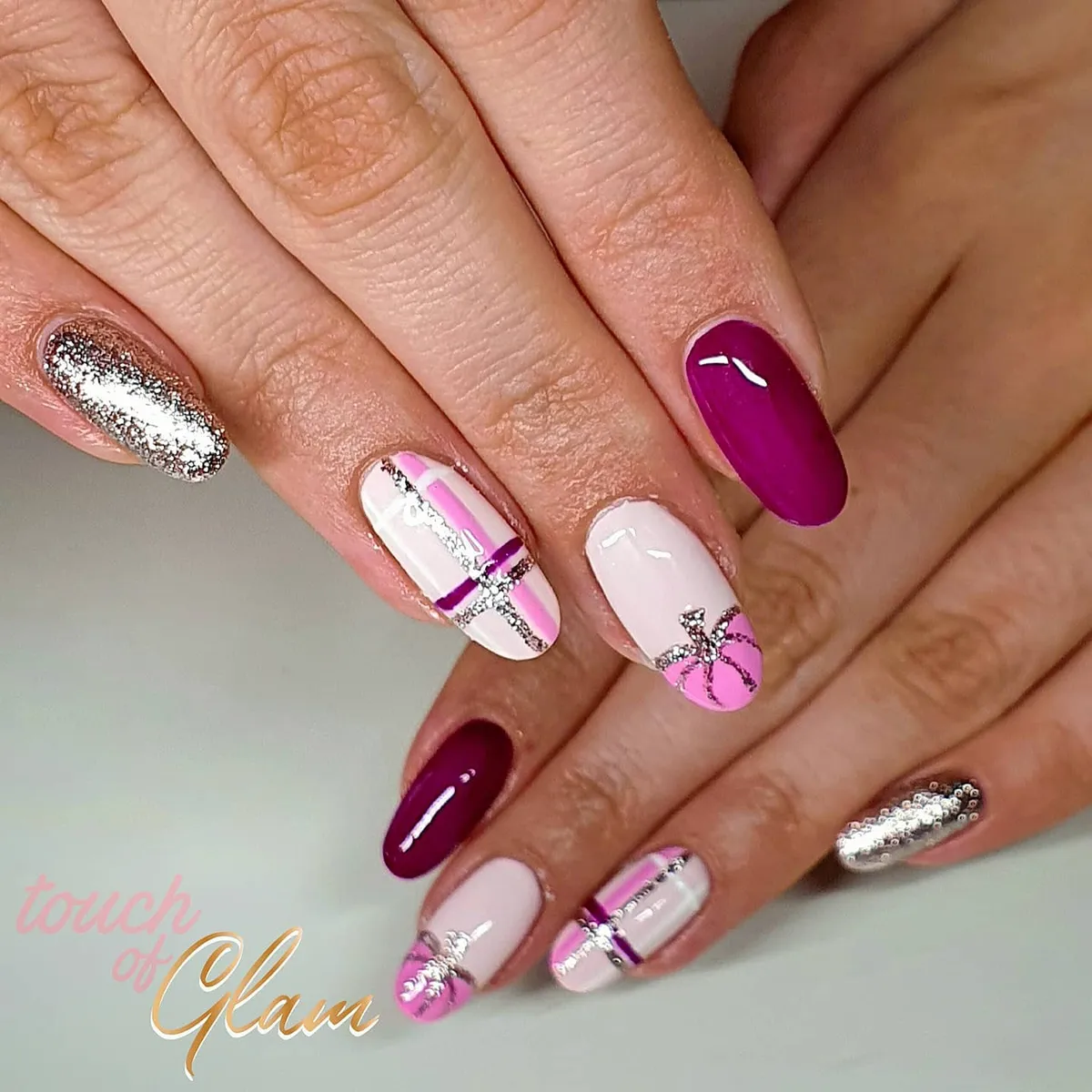 Magenta and pale pink with silver glitter grids and bow accents