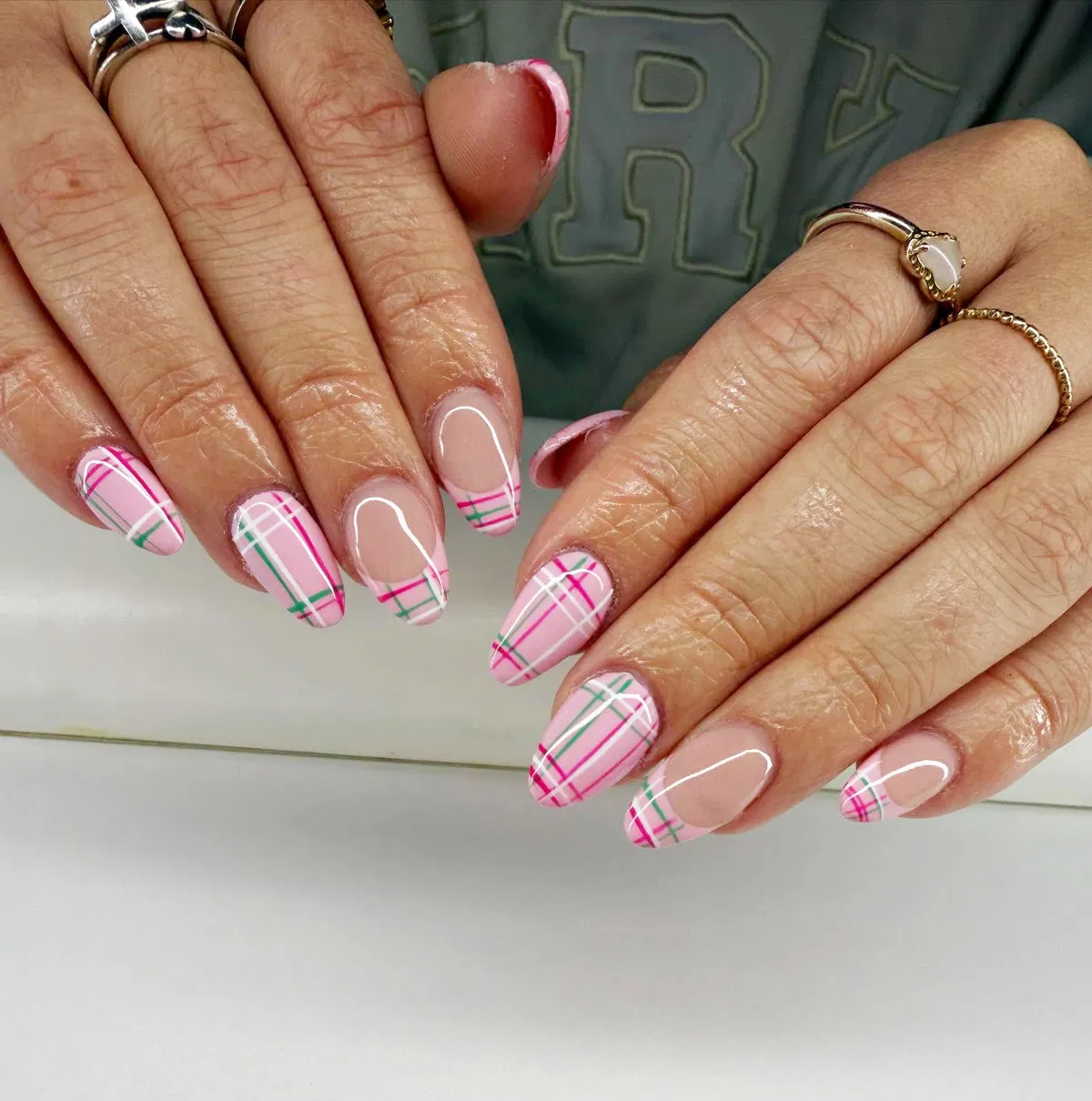 Nude base with pink-and-green plaid tips