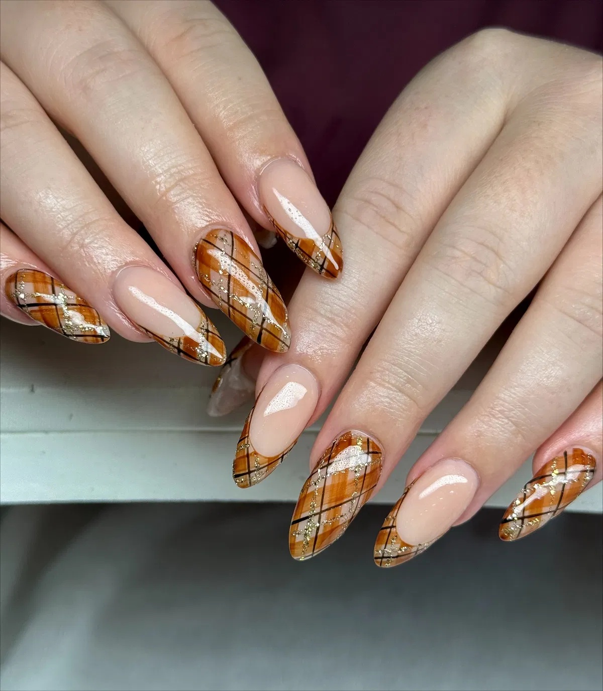 Diagonal warm plaid with gold glitter lines