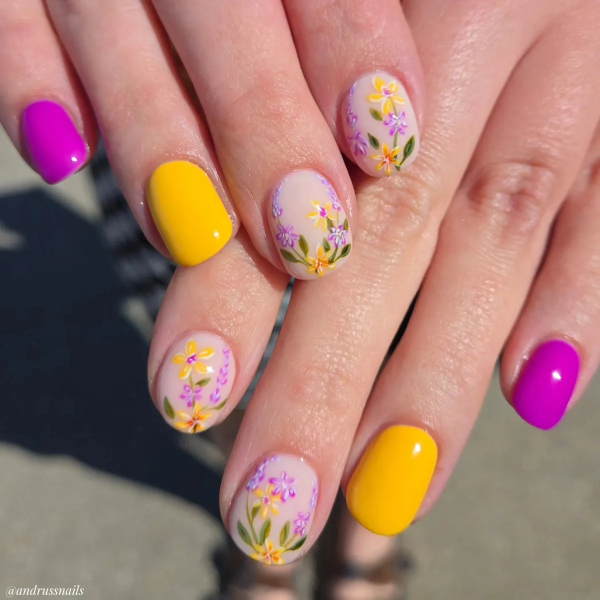 Bright purple and yellow solids with delicate floral nude accents