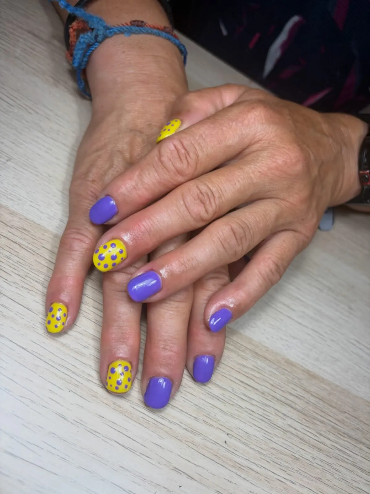 Simple purple solids with yellow polka-dot accents