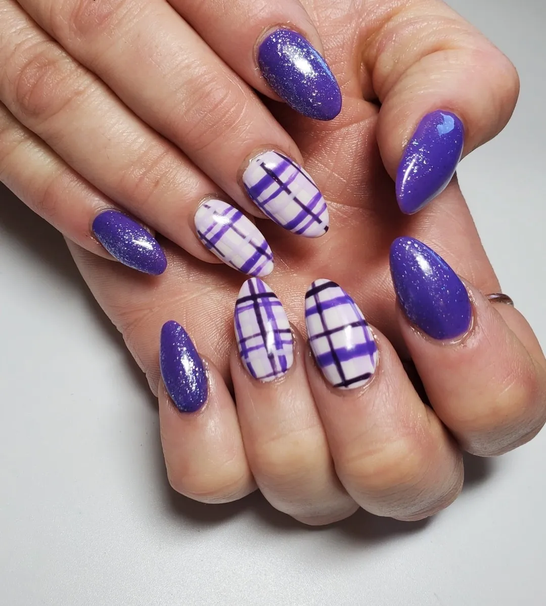 Glittery purple solids with white-and-purple plaid accents