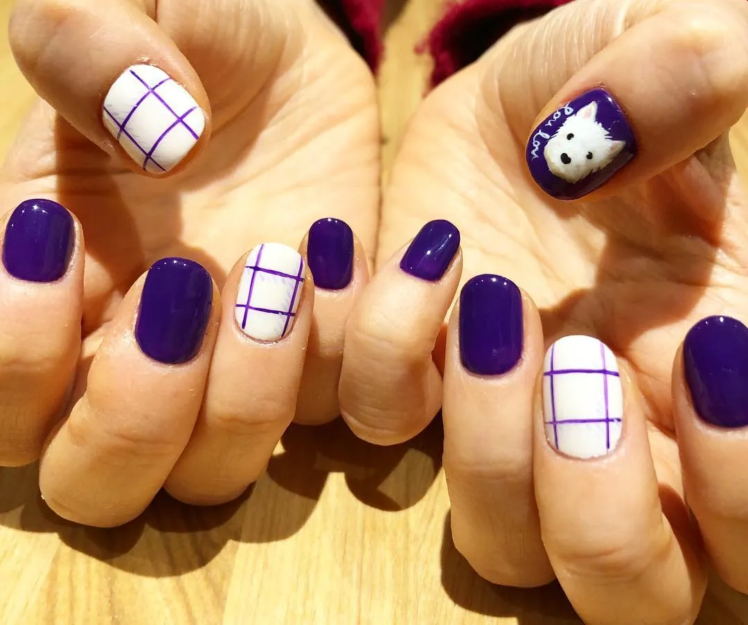 Deep purple solids with white grid accents and an animal-face thumb
