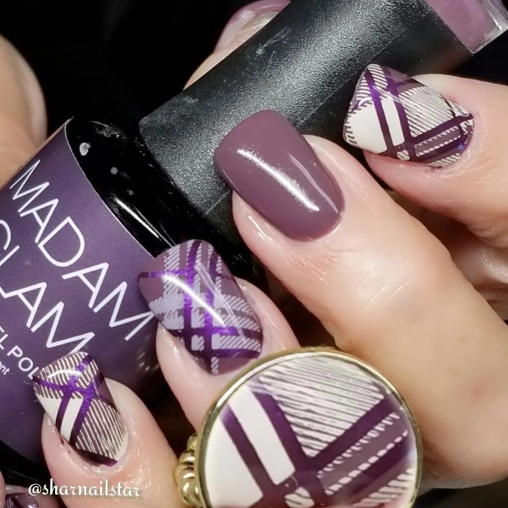 Muted purple with diagonal-hatched plaid and visible bottle text