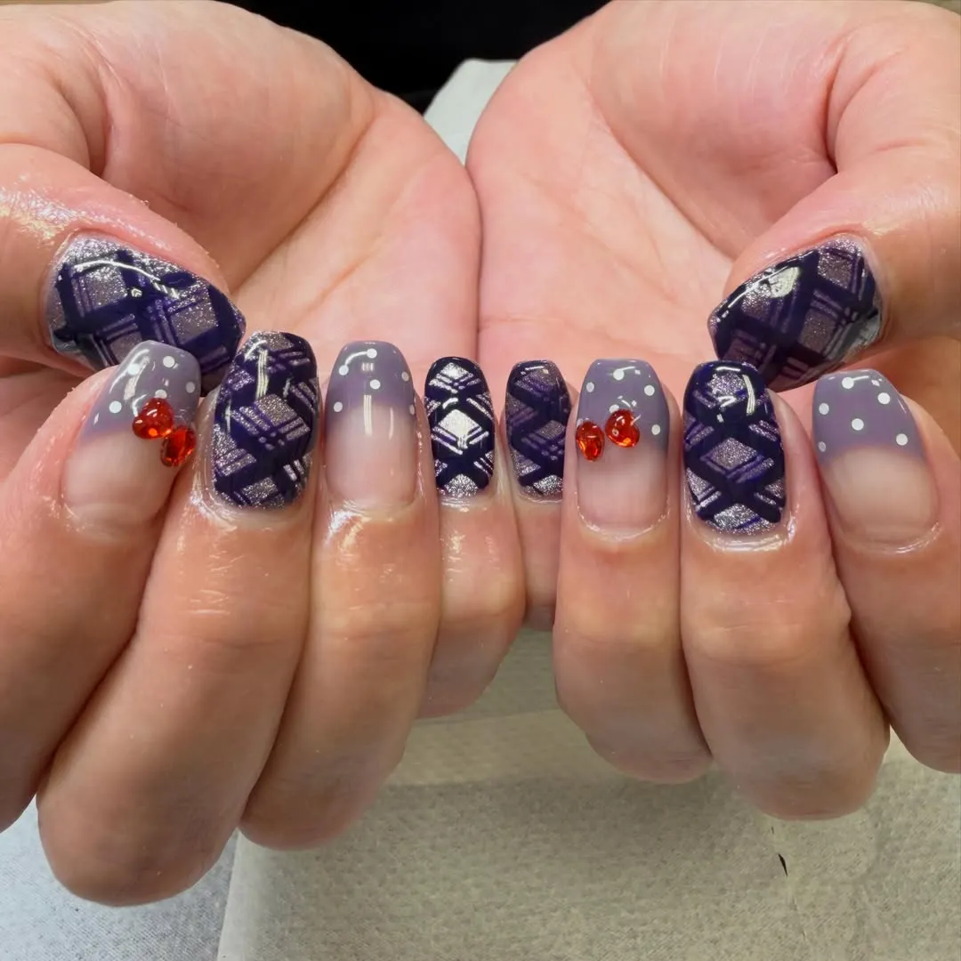 Dark purple plaid with dotted gray gradient and red gem accents