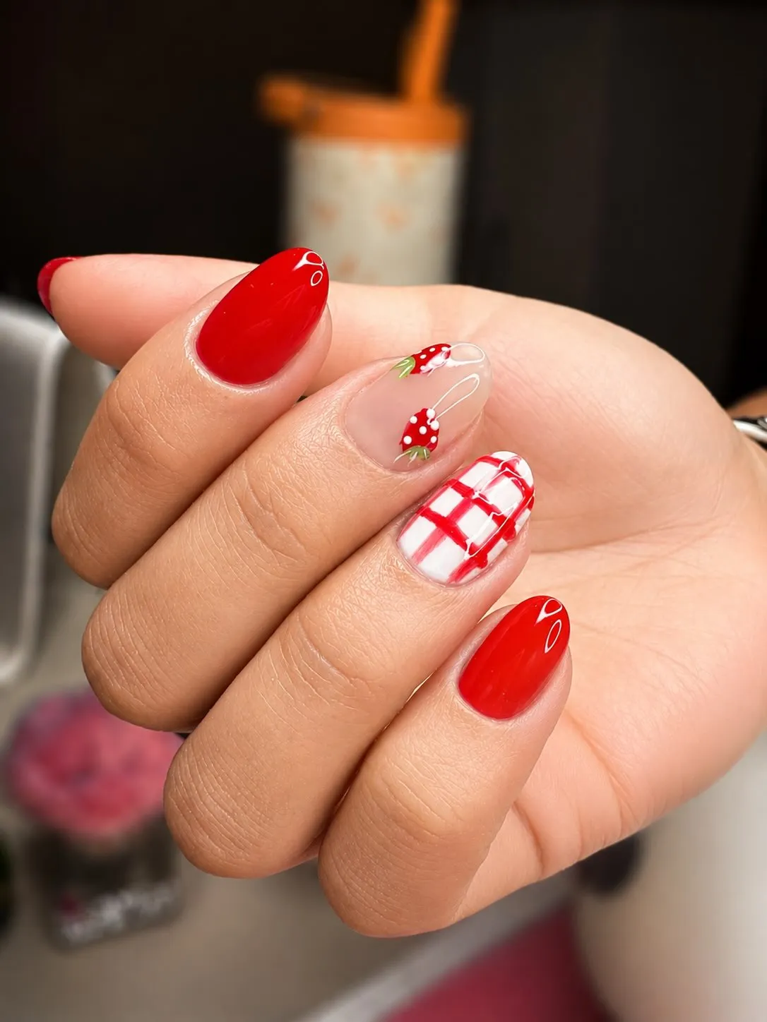 Bright red with white plaid and strawberry-like accent