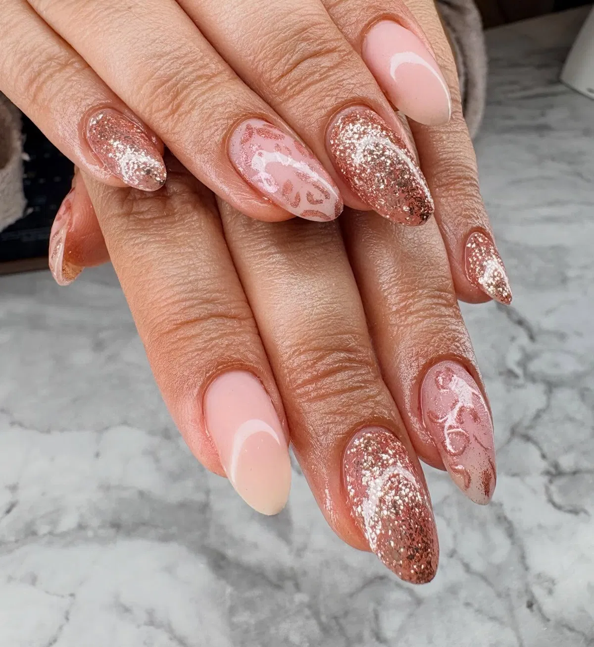 Nude pink and rose-gold glitter mix with swirly accents