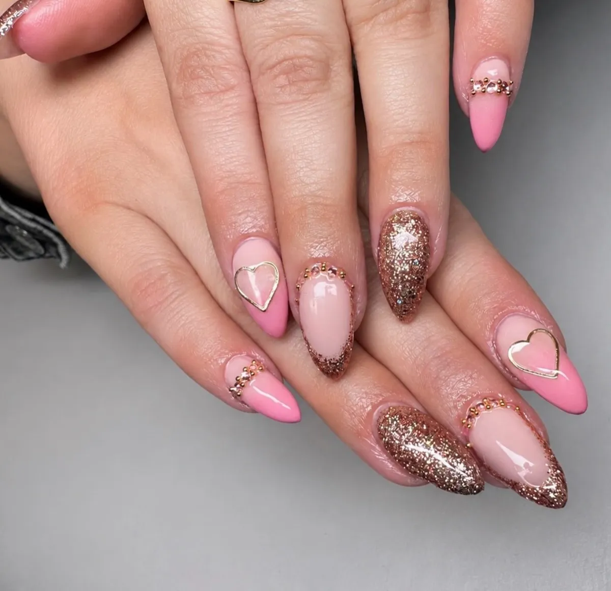 Pink and rose-gold glitter mix with heart outlines and bead accents