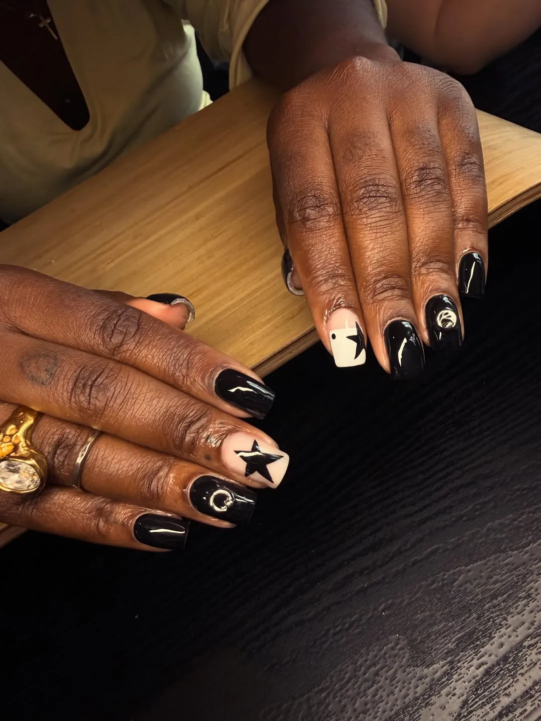 Black Nails with Star Accent Nails