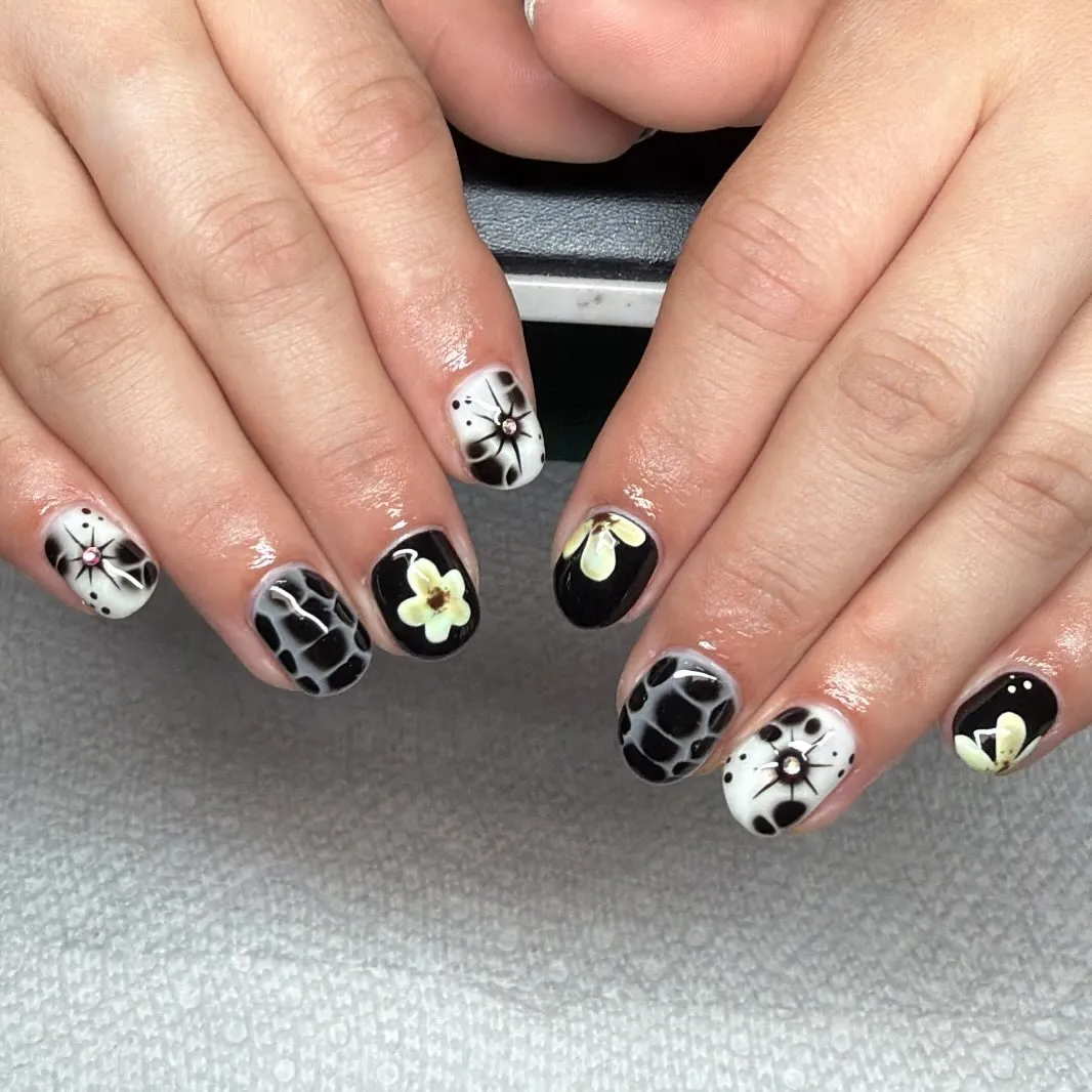 Mixed black-and-white patterns with floral accents