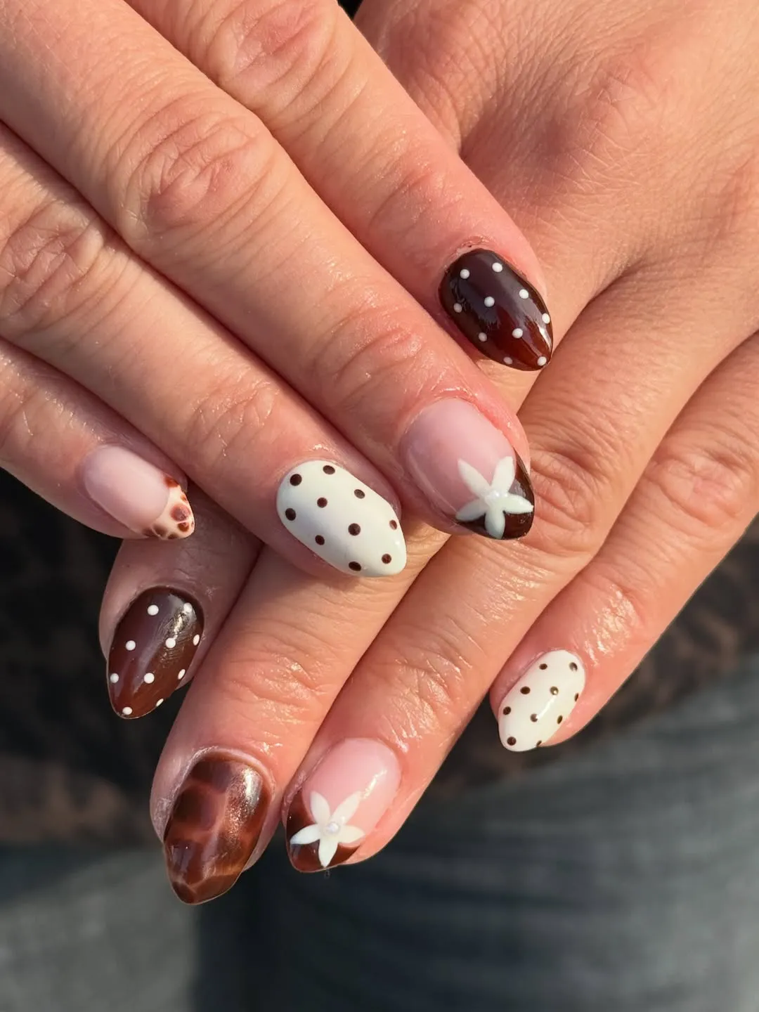 Polka dots and a white flower with brown accents