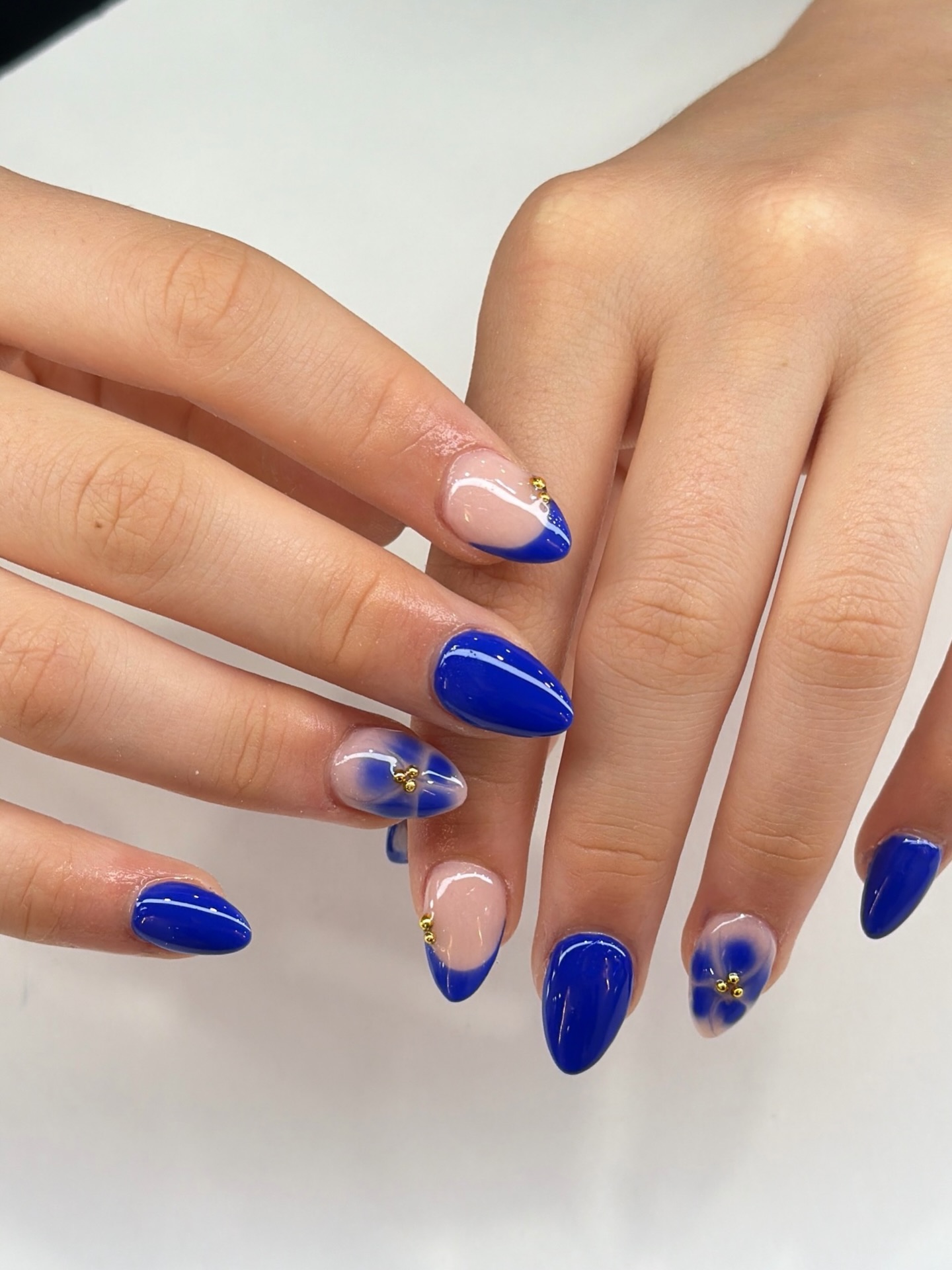 Bright blue mix with floral blue accents and gold studs