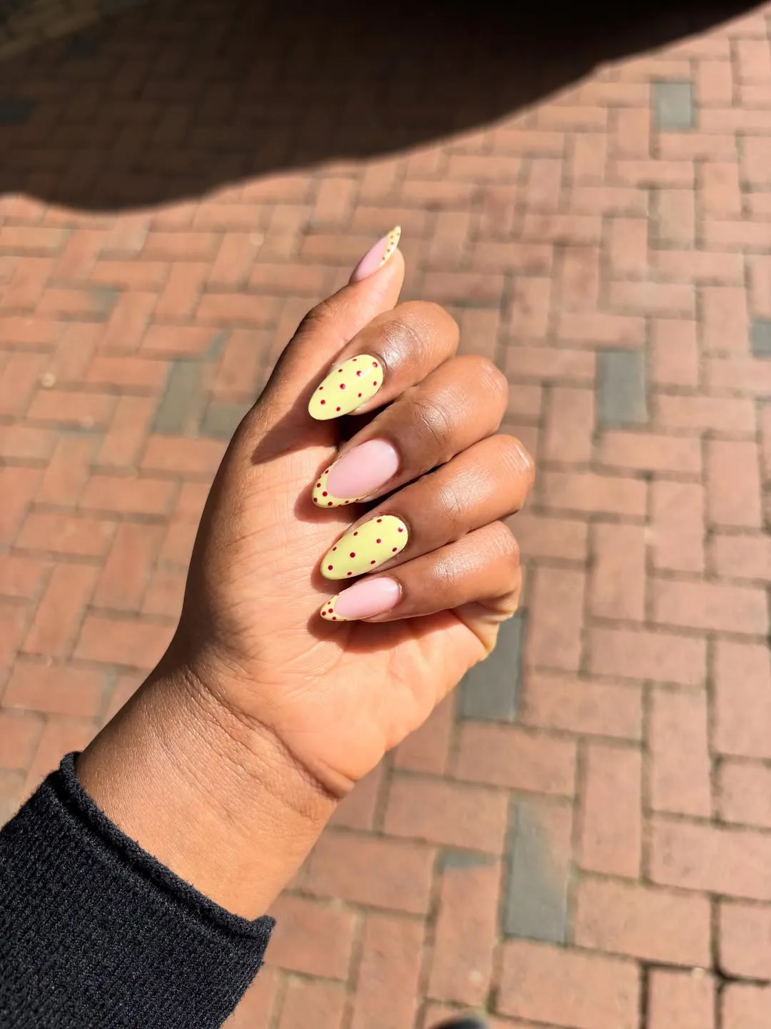 Pale yellow French tips with raised white florals and gold linework