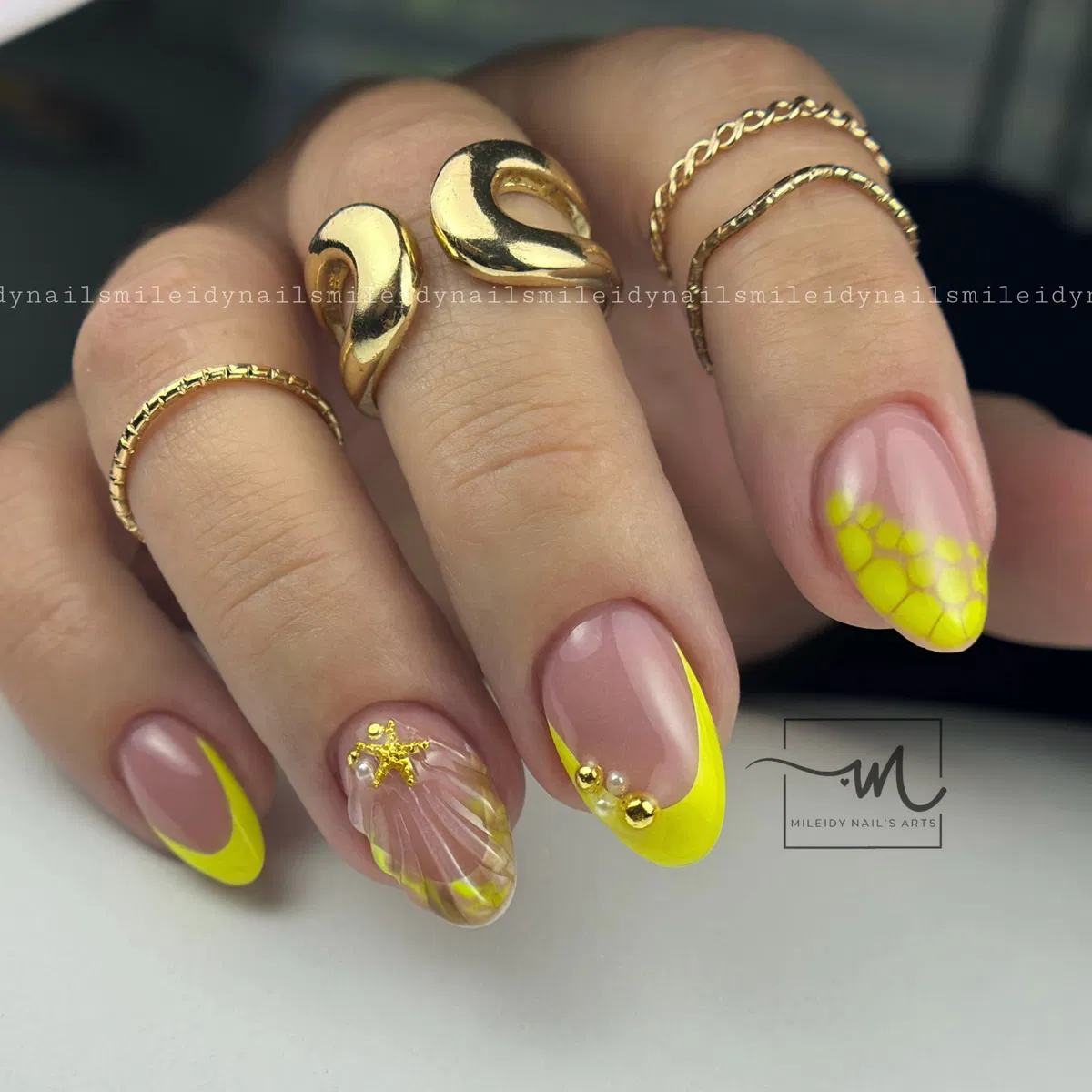 Pale yellow French tips with hot pink strokes