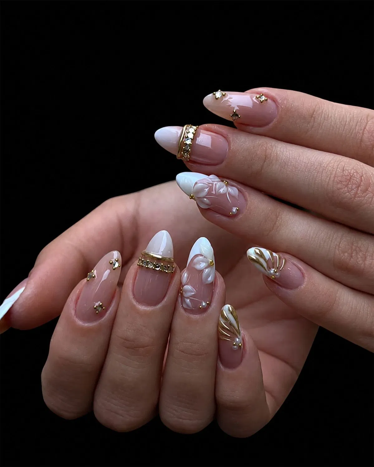 Minimal nude set with gold bands, studs, and raised petals