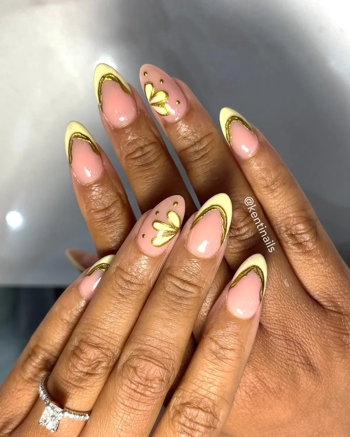 Pale Yellow French Tips with Gold Outlines and Butterfly Accents