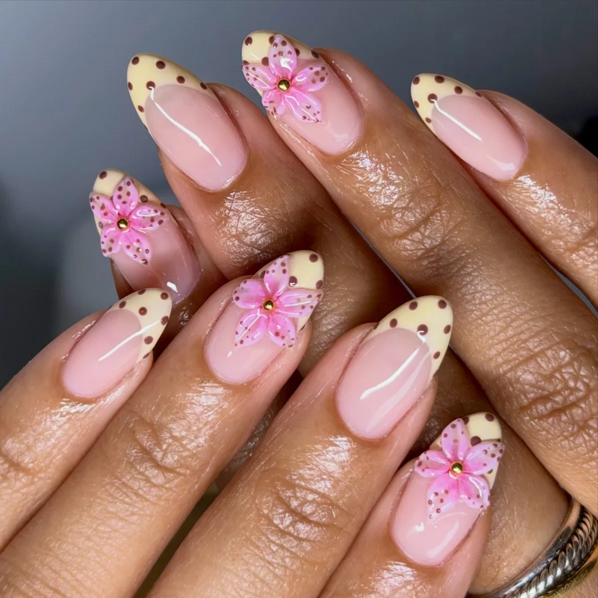 Pink base with dotted yellow tips and raised pink flowers