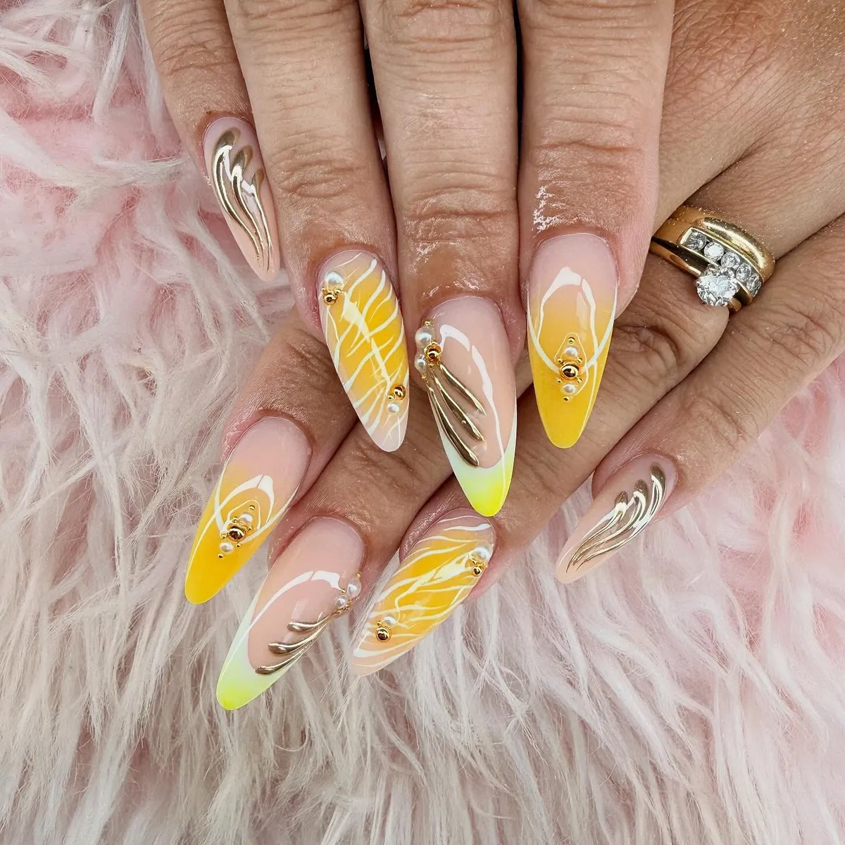 Embellished yellow ombre with white waves, pearls, and metallic gold accents