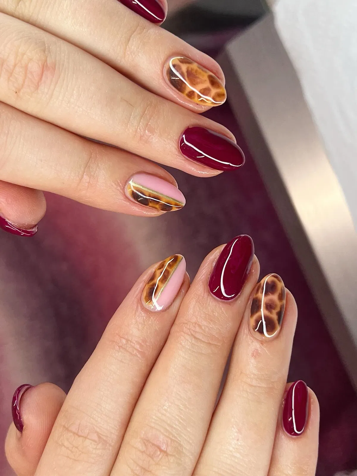 Burgundy gloss with tortoiseshell accents