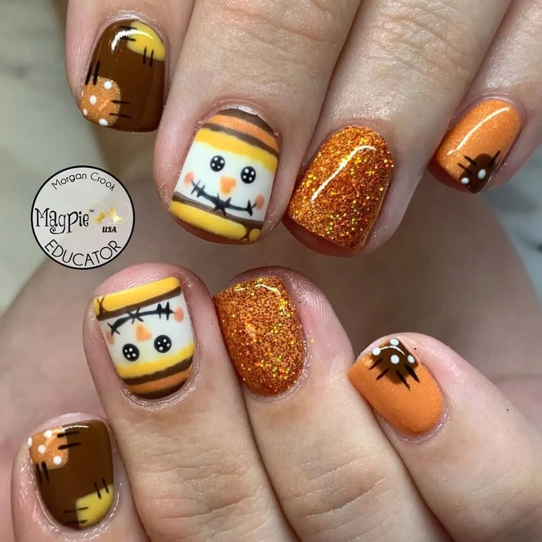 Cartoon face accents with orange glitter and brown stitched details