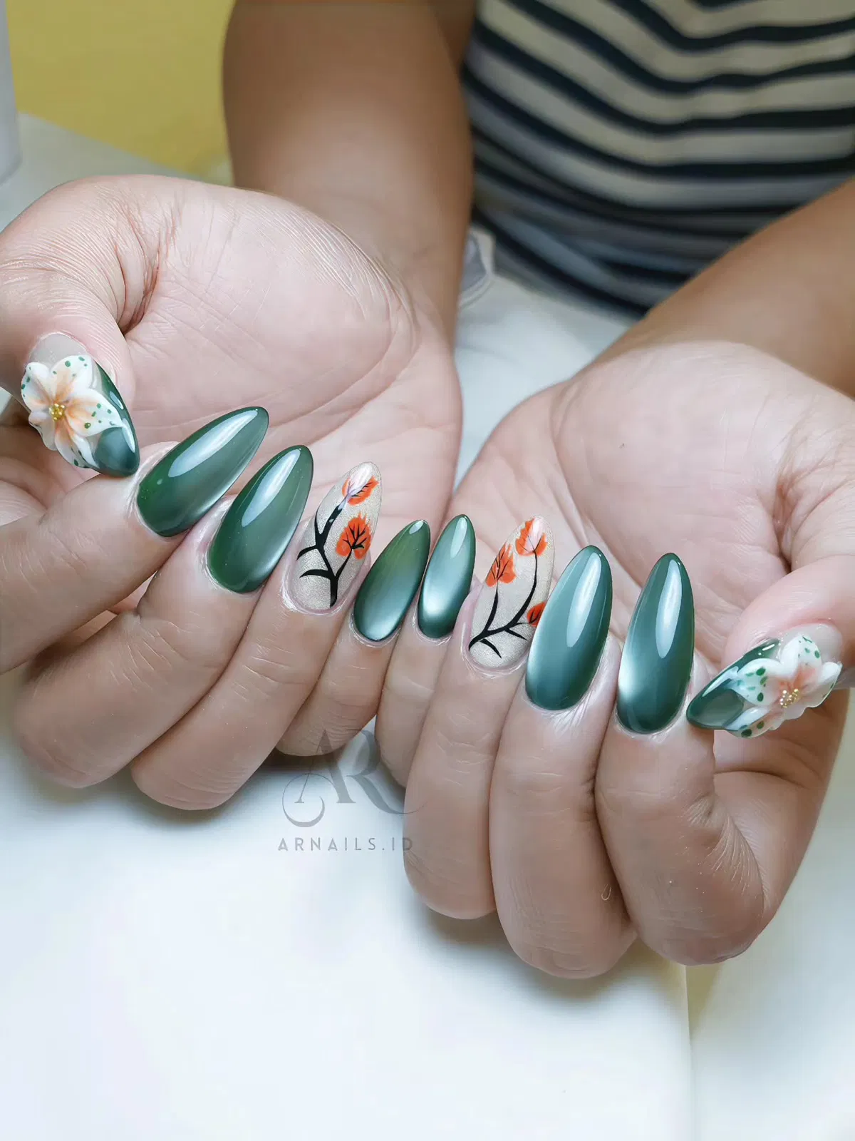 Dark green almonds with branch-and-leaf accents and 3D flowers