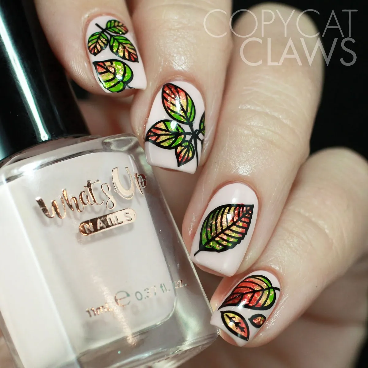 Black-outlined multicolor shimmer leaves on nude base
