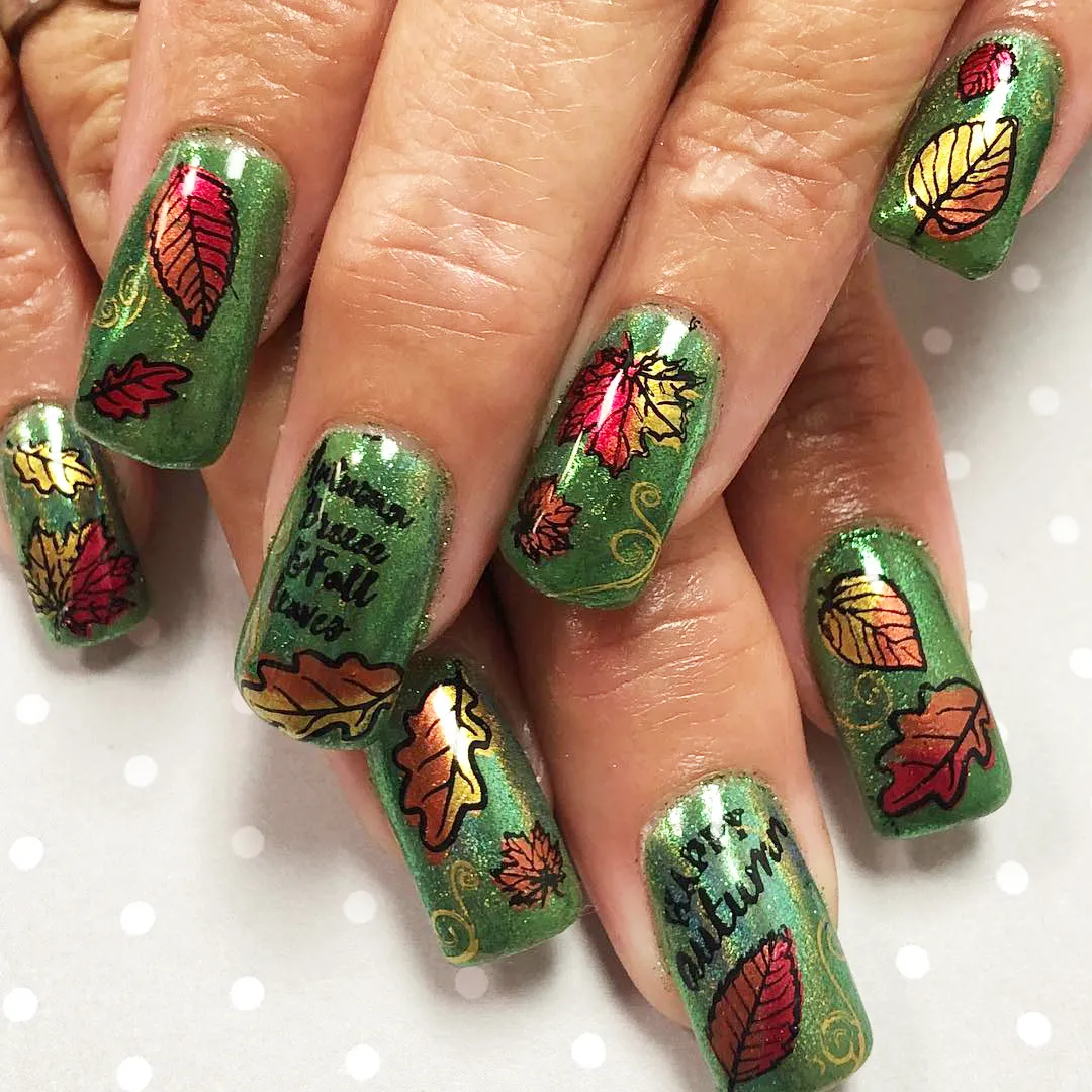 Shimmery green base with multicolor leaf decals and text
