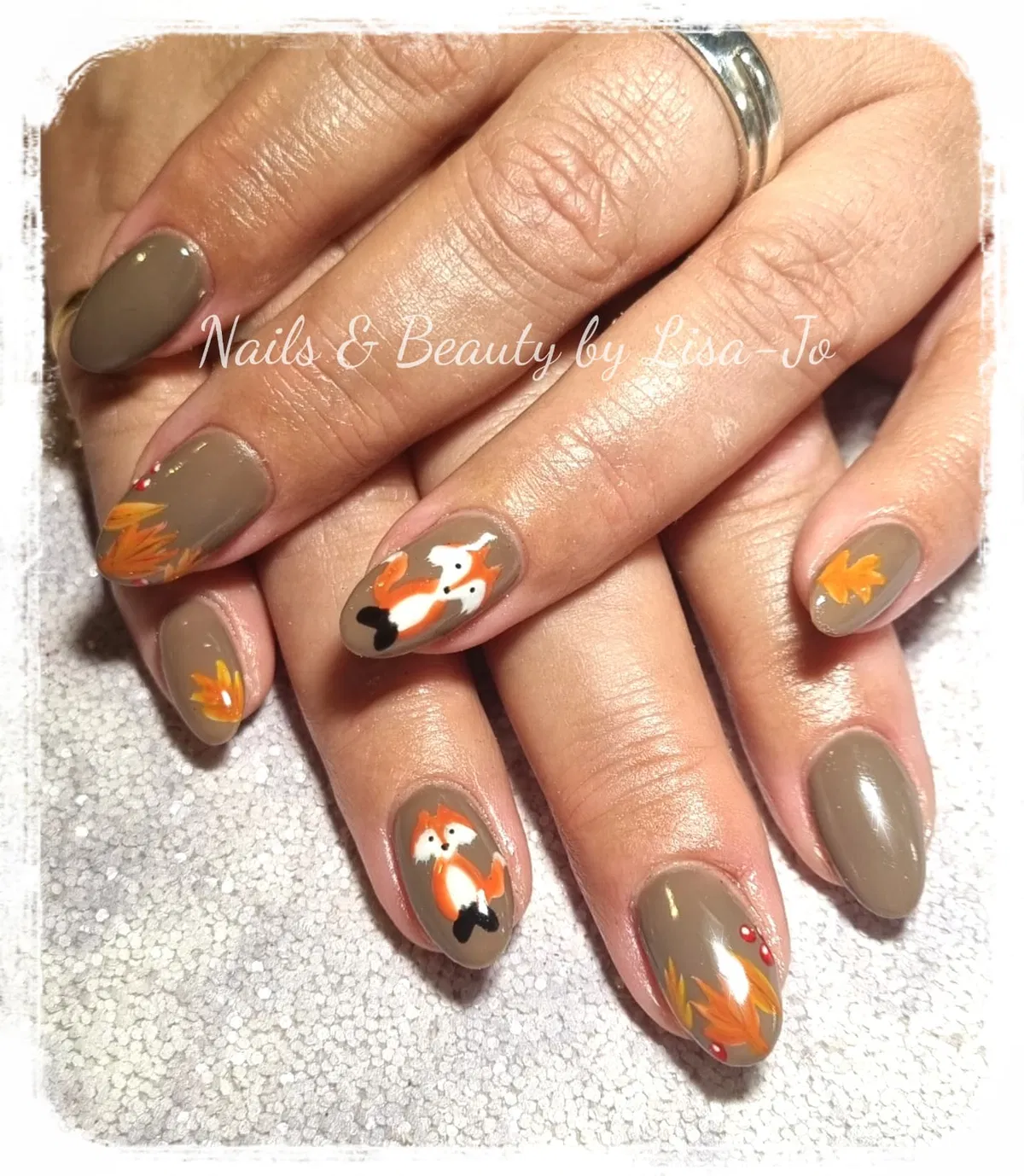 Taupe almonds with orange leaves and fox illustrations