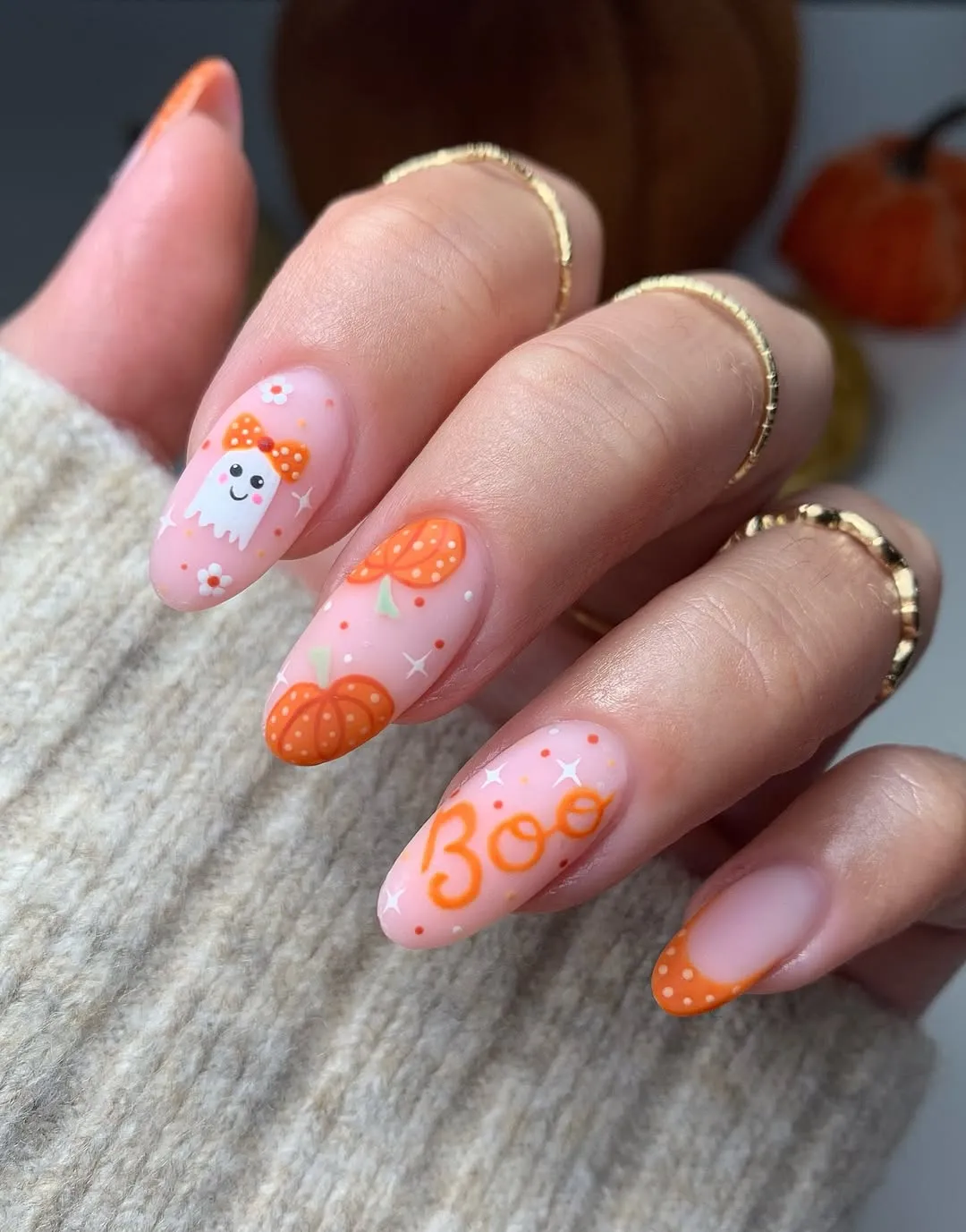 Pink-and-orange set with โBoo,โ pumpkins, and a sweet little ghost