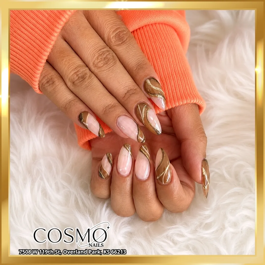 Nude base with brown-and-gold swirl striping