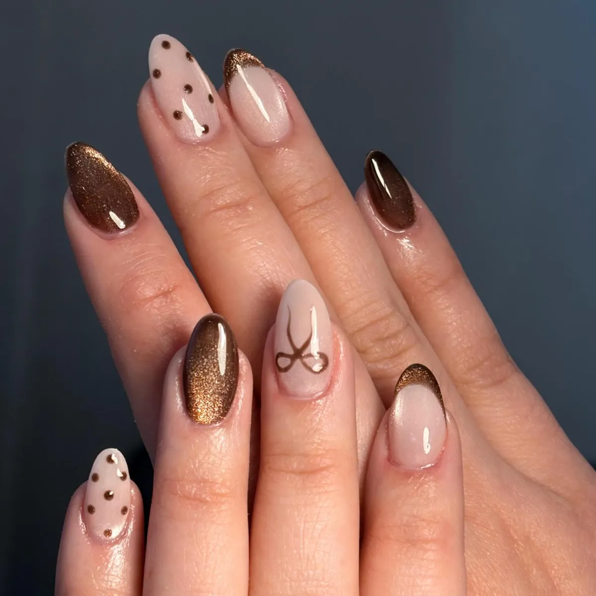 Brown and nude with bronze tips, dots, and a bow accent
