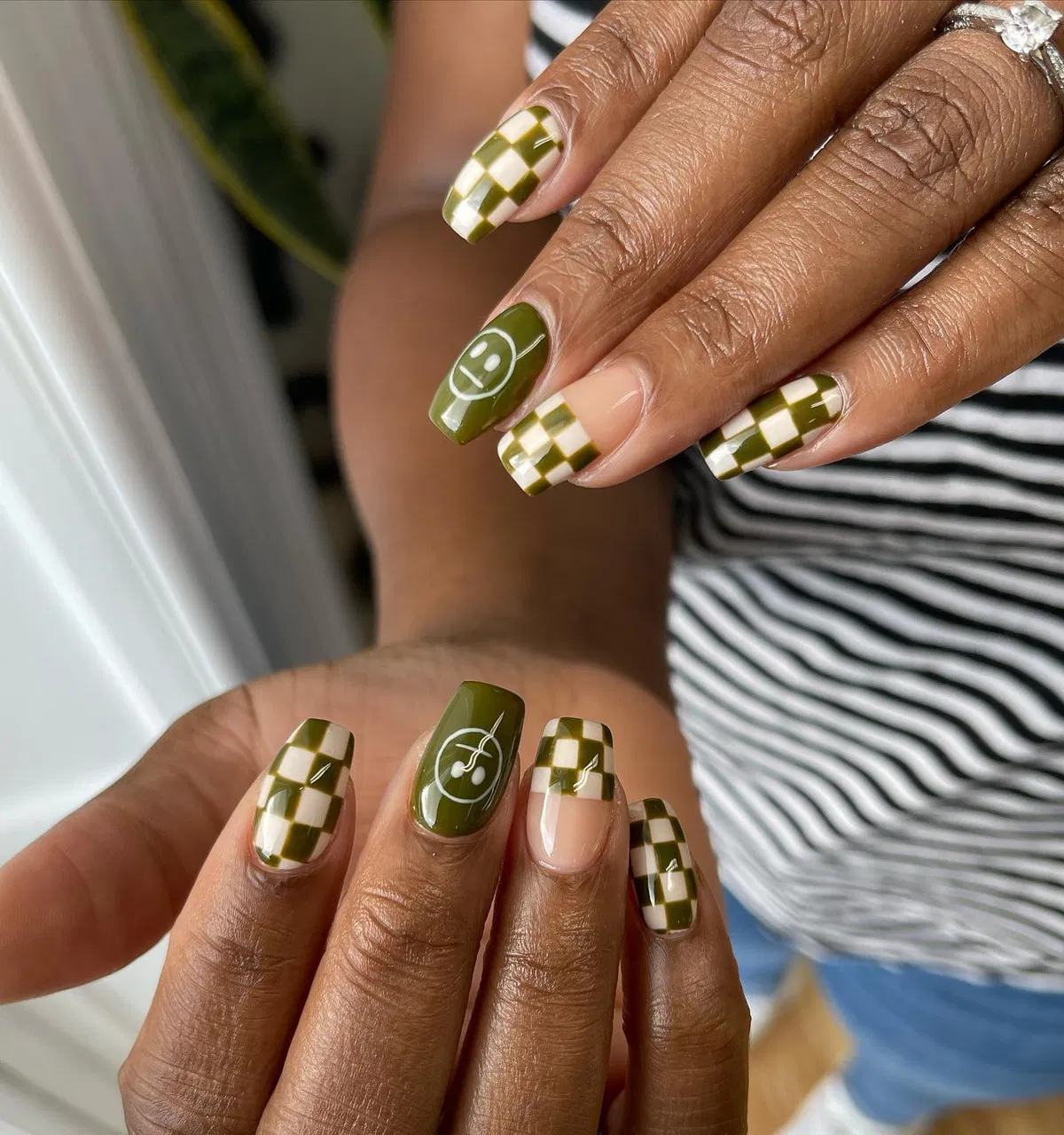 Olive checkerboard with smiley-face accents