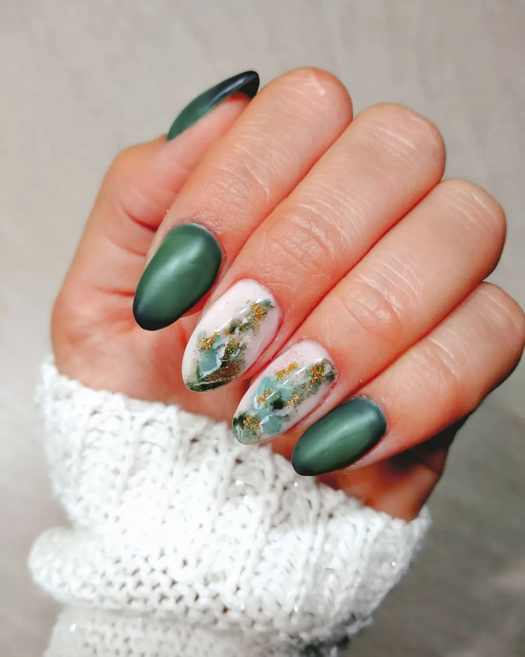 Matte deep green with marbled white-and-green glitter accents