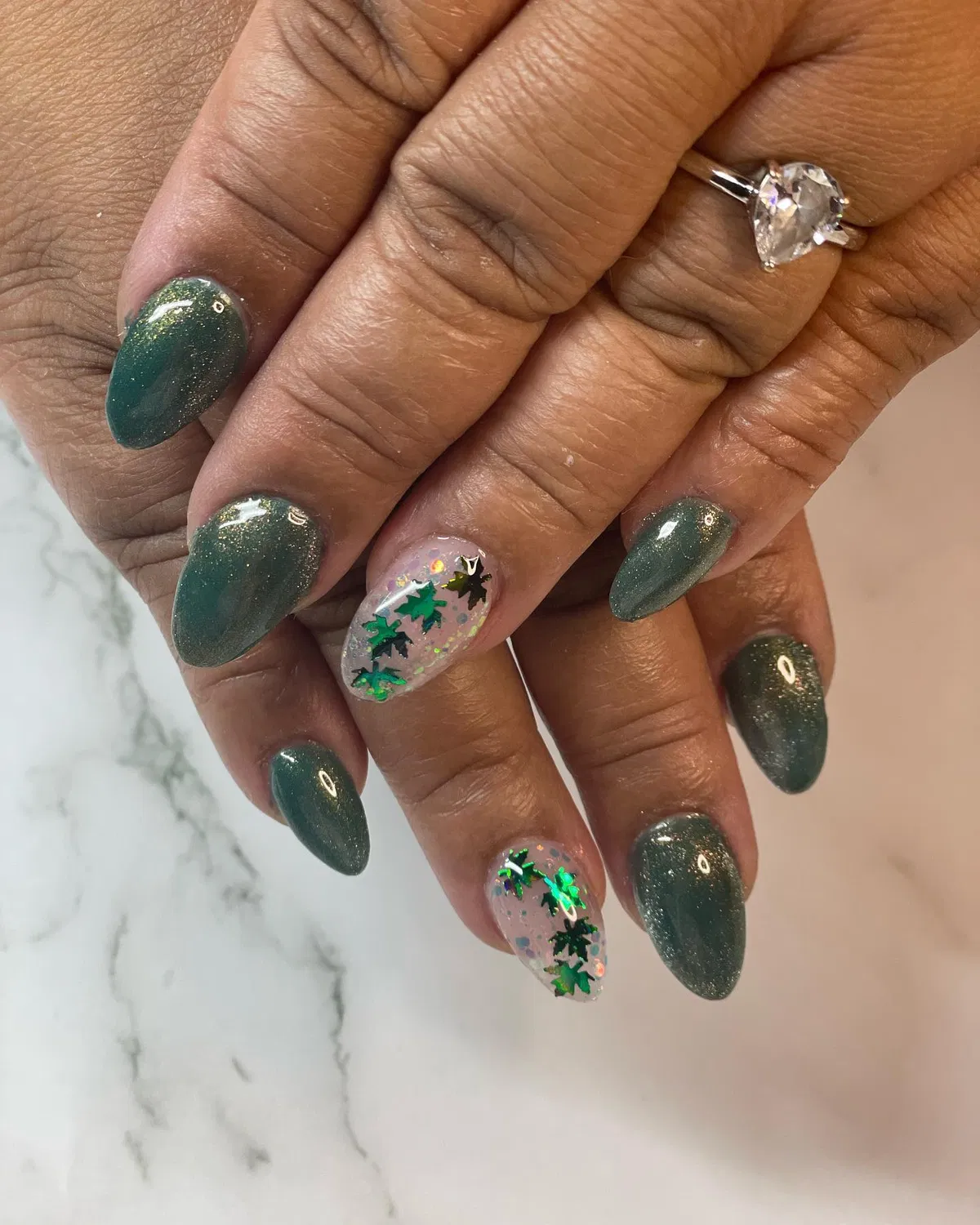 Green shimmer with leaf confetti on translucent accents