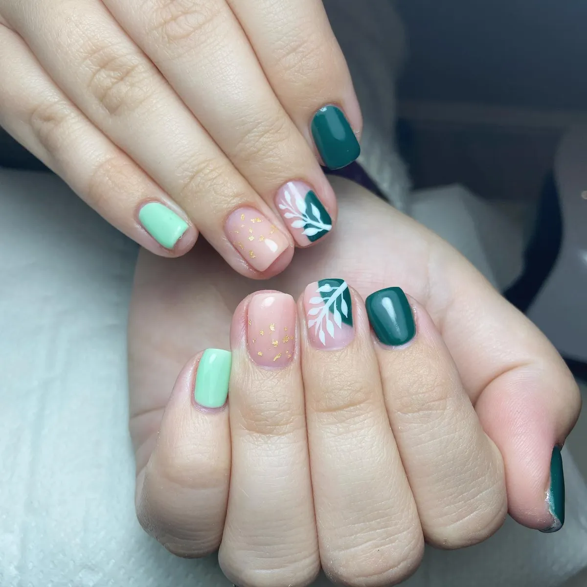 Teal and mint with white leaf accents and gold flecks