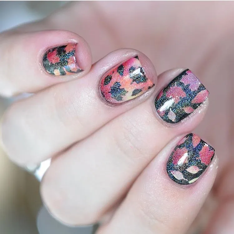 Dark all-over leaf print nails