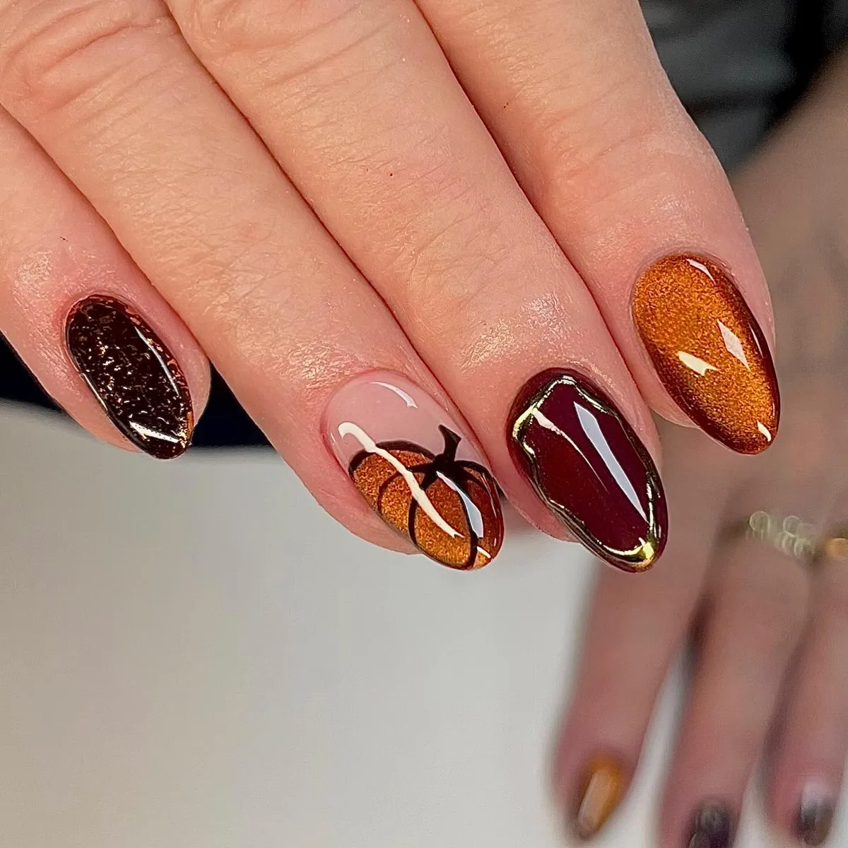 Deep burgundy and copper shimmer with nude pumpkin accent