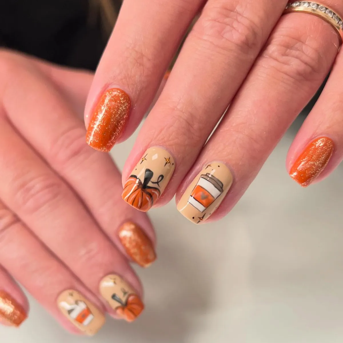Orange glitter with beige pumpkin-and-cup illustrations