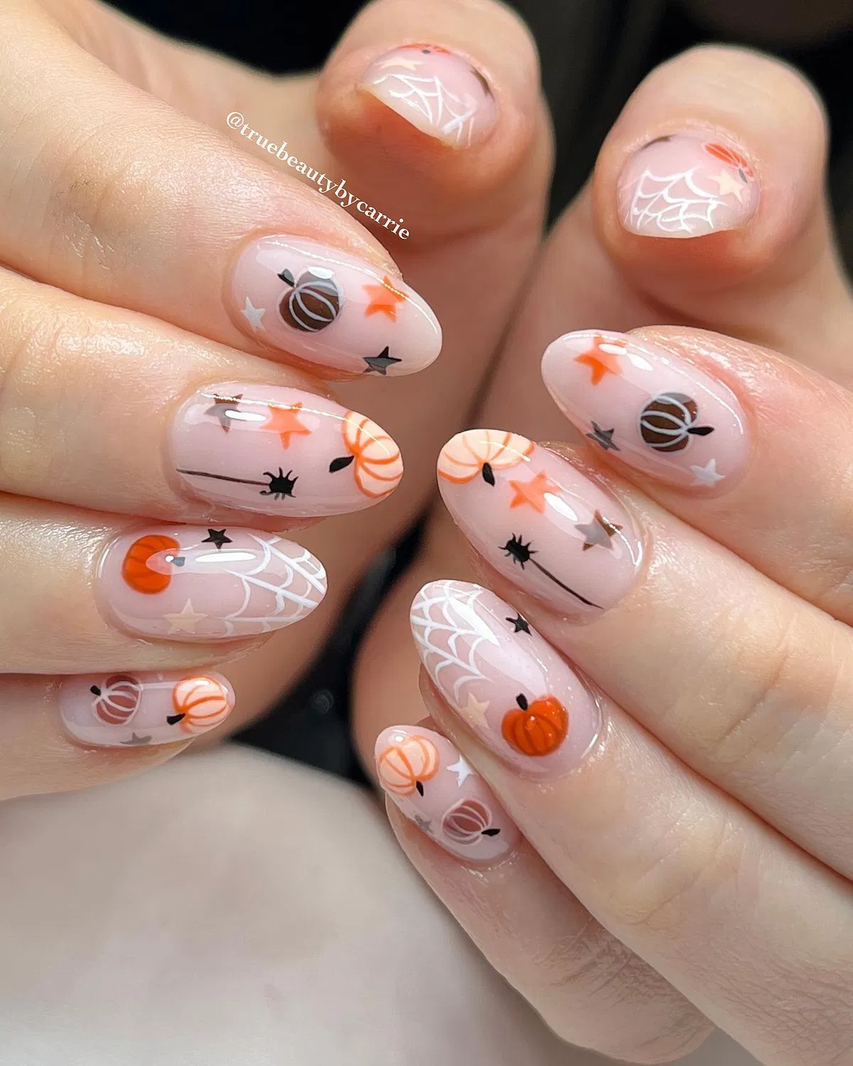 Sheer nude base with pumpkins, spiderwebs, and stars