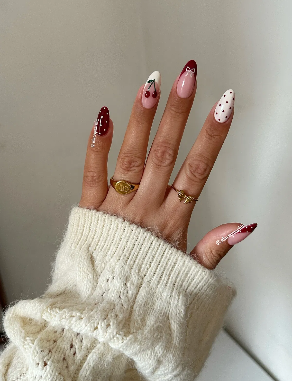 Cherry and polka-dot accents with red French tips