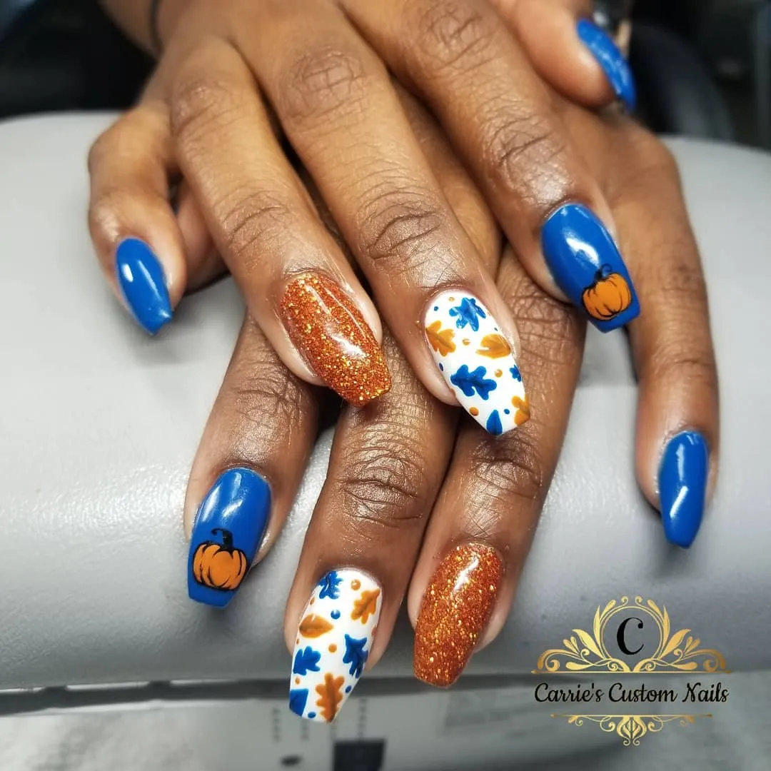 Bright blue with pumpkins, leaf print, and orange glitter accents