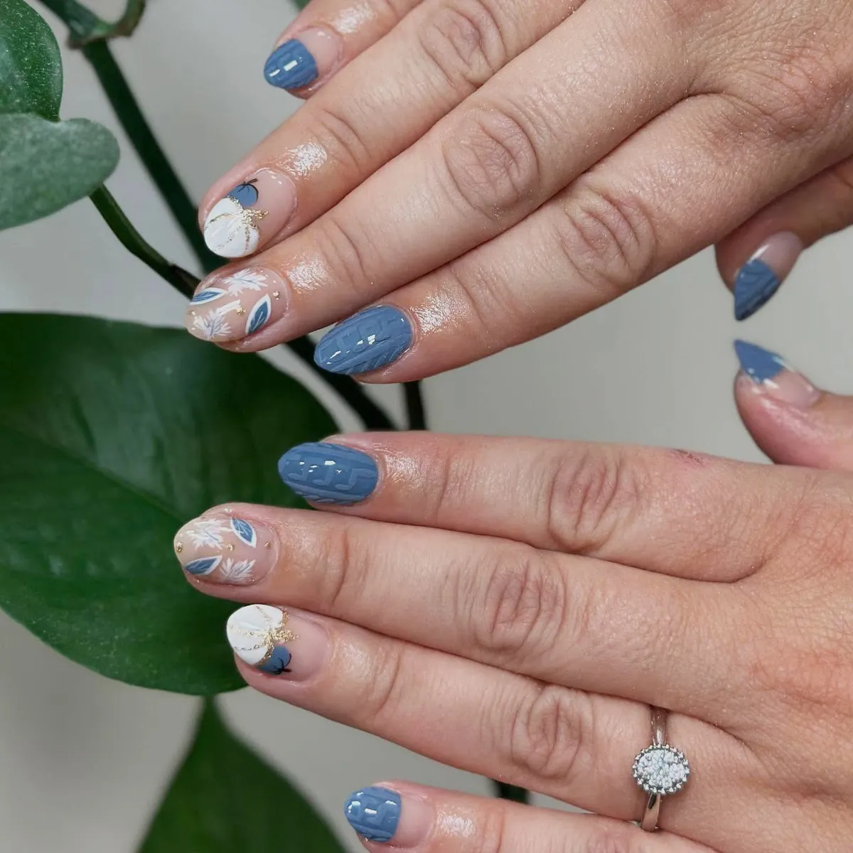 Dusty blue textured nails with nude botanical and pumpkin accents